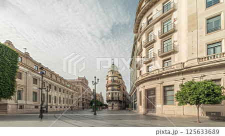 Street view of Constitucion avenue with historical buildings and trams timelapse 125633689