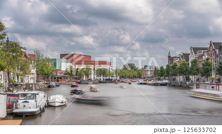 Hyperlapse of the exterior facade of the National Opera music and theatre venue. Amsterdam, The Netherlands Hyperlapse of the exterior facade of the National Opera music and theatre venue. Amsterdam, The Netherlands 125633702