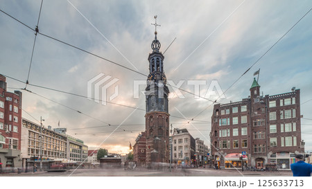 Munttoren tower and flowers market. Panoramic timelapse hyperlapse of Amsterdam city center. Netherlands Munttoren tower and flowers market. Panoramic timelapse hyperlapse of Amsterdam city center. Netherlands 125633713