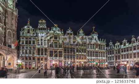Night hyperlapse of the illuminated Grand Place Guilds facade in Brussels, Belgium. Night hyperlapse of the illuminated Grand Place Guilds facade in Brussels, Belgium. 125633748