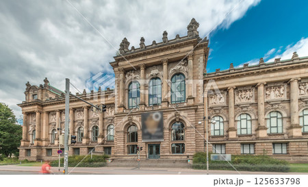 Hyperlapse of Hanover's Lower Saxony State Museum with passing traffic and people in front of its historic facade. Germany 125633798