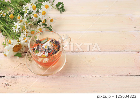 Floral composition of wild herbs and flowers on a wooden table in a rustic style, autumn background, tansy, Floral composition of wild herbs and flowers on a wooden table in a rustic style, autumn background, tansy, 125634822