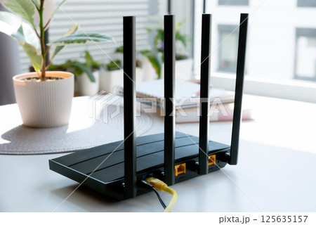 Router with 4 antennas in living room 125635157