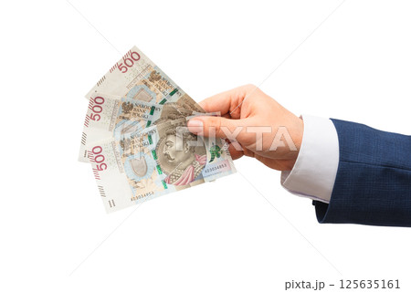 Polish 500 PLN banknotes in hand 125635161