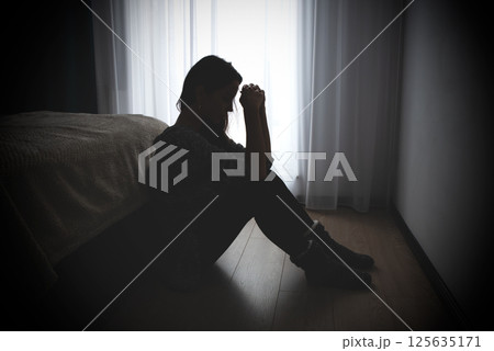 Woman suffering from depression 125635171