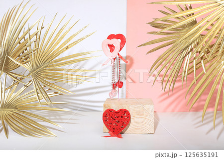 Abstract background with natural wooden podiums and long shadows on a pink wall, an empty showcase for cosmetic products demonstration or presentation, minimal ecology concept, selective focus 125635191