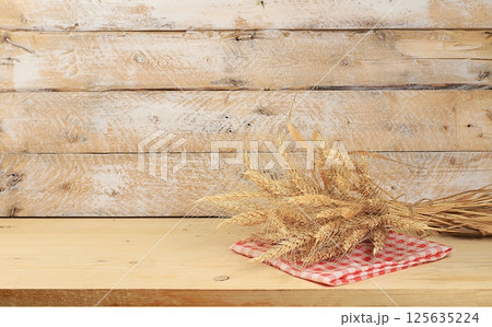 Abstract background with natural wooden podiums and long shadows on a pink wall, an empty showcase for cosmetic products demonstration or presentation, minimal ecology concept, selective focus 125635224