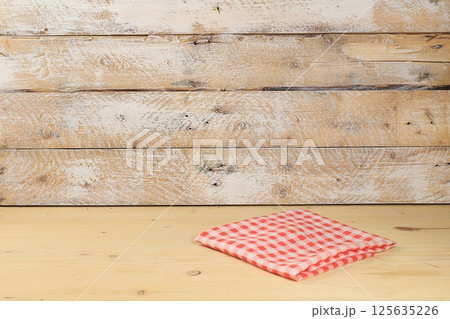 Abstract background with natural wooden podiums and long shadows on a pink wall, an empty showcase for cosmetic products demonstration or presentation, minimal ecology concept, selective focus Abstract background with natural wooden podiums and long shadows on a pink wall, an empty showcase for cosmetic products demonstration or presentation, minimal ecology concept, selective focus 125635226