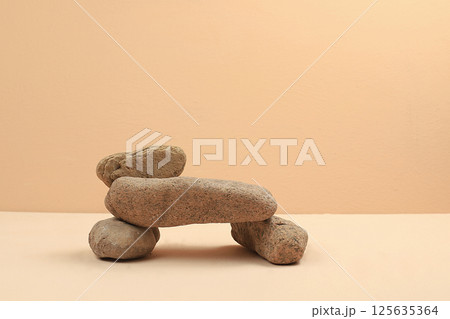 Empty premium podium with stone coasters, Minimal abstract background for cosmetic products presentation. template for design, pedestal podium, selective focus 125635364