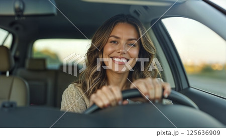 A smiling woman driving a car radiates joy and confidence, symbolizing freedom, independence, empowerment, and gender equality - ai generated 125636909