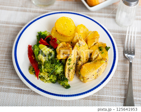 Popular dish of chicken breast with vegetables Popular dish of chicken breast with vegetables 125641953