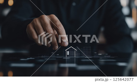 Businessman Interacting with Virtual Home Icon 125642077