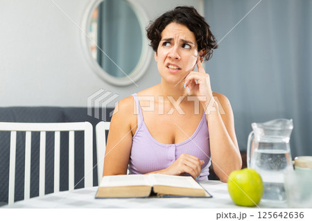 Woman is hysterical about not being able to learn her lessons for exams 125642636