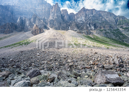 Rock and debris caused by landslides along at Mt. Babel on the Moraine Lake Rockpile Trail in the Rocky Mountains Rock and debris caused by landslides along at Mt. Babel on the Moraine Lake Rockpile Trail in the Rocky Mountains 125643354