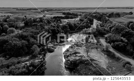 Drone flying over Split Rock Creek running through Palisades State Park in Garretson, South Dakota Drone flying over Split Rock Creek running through Palisades State Park in Garretson, South Dakota 125643553