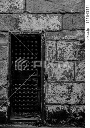 Heavy reinforced door to the guardhouse of Eastern State Penitentiary historic site. 125643554
