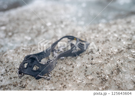 Selective focus on chain spikes used for added traction on ice.  125643604