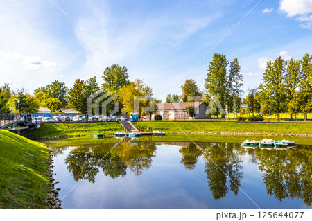 Brest City Park Belarus green nature river lake pond bridge. 125644077
