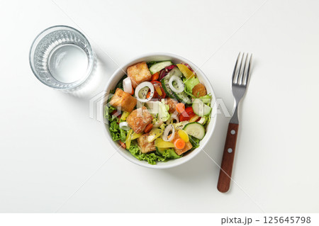 Fried tofu salad with vegetables and sauce top view 125645798