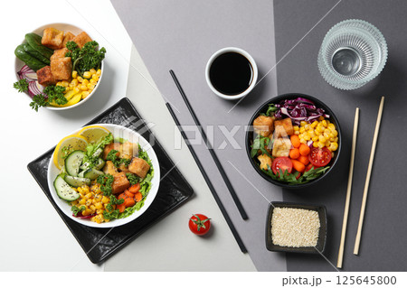 Fried tofu salad with sticks and soy sauce Fried tofu salad with sticks and soy sauce 125645800