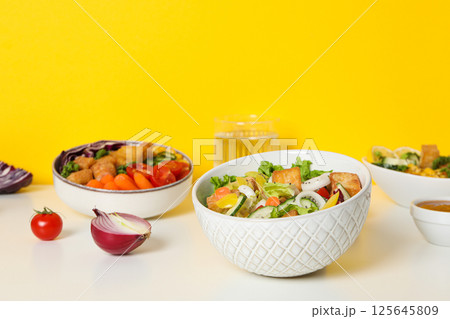 Fried tofu salad with sauce and vegetables Fried tofu salad with sauce and vegetables 125645809