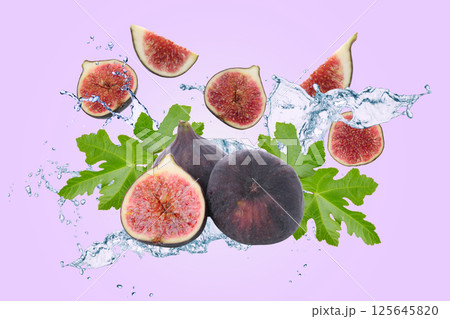 Healthy food, Figs, leaves and water on light purple background 125645820