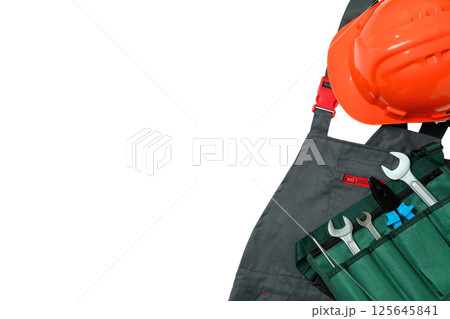 Safety gear and tools represent Labor Day for hardworking Americans, isolated on white 125645841