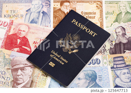 American passport on Icelandic money 125647713