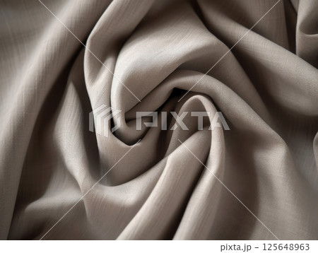 Fabric background. Minimalist beige-gray textile surface with natural folds and fine woven texture. 125648963