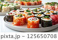 Side view of a vibrant sushi arranged in rows, showcasing an array of colorful rolls and nigiri adorned with fresh fish, avocado, and colorful ingredients 125650708