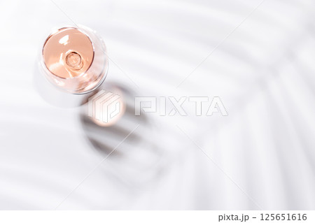 A glass of rose wine A glass of rose wine 125651616