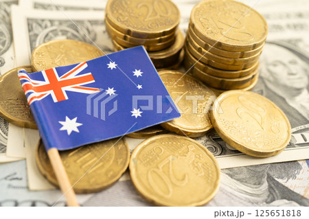 Australia flag on coin and banknote money, finance trading investment business currency. Australia flag on coin and banknote money, finance trading investment business currency. 125651818