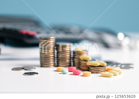 Saving money on health care can be challenging, but with proper insurance, you can manage the cost of medicine and pills while navigating the pharmaceutical business and maintaining your health. 125653620
