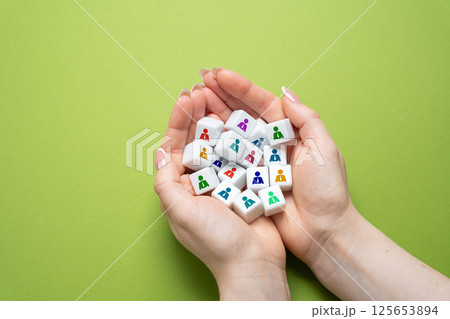 Cubes with people in palms. Human resources department. Recruitment and management of employees. Employee selection, and team building. Organizational control, talent acquisition, and HR strategy. 125653894