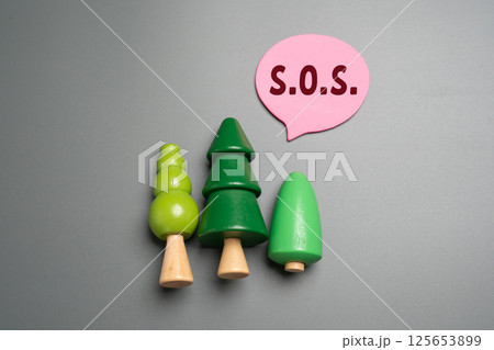 Forest figures and SOS call. Highlighting urgent environmental concerns, deforestation, and a cry for ecological preservation and action. Request for help to preserve the conservation area. Forest figures and SOS call. Highlighting urgent environmental concerns, deforestation, and a cry for ecological preservation and action. Request for help to preserve the conservation area. 125653899