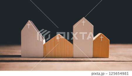 Church with its cross symbolizing Jesus Christ, stands as holy building where community gathers in faith and belief to worship God. church, cross, jesus christ, belief, community, estate, faith, god. 125654981
