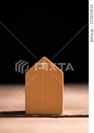 Church with its cross symbolizing Jesus Christ, stands as holy building where community gathers in faith and belief to worship God. church, cross, jesus christ, belief, community, estate, faith, god. 125655014