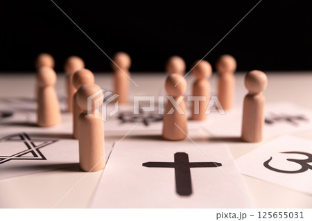 Concept of interfaith dialogue promotes understanding and spirituality by bringing together symbols, beliefs from diverse religions Hinduism, Islam, Judaism, Buddhism, faith and religious harmony. 125655031