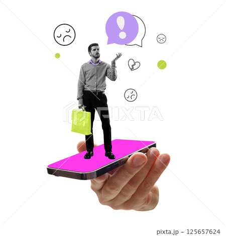 Black and white businessman on pink phone stands unimpressed with sad icons and exclamation bubble floating above 125657624