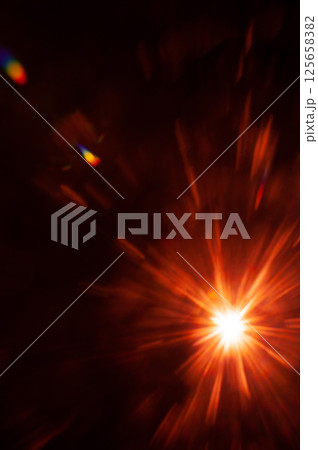 Sun flare on the black background 125658382