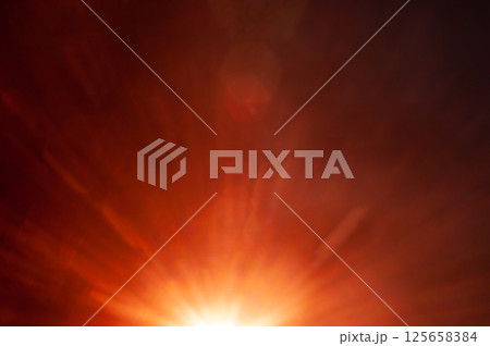 Sun flare on the black background 125658384
