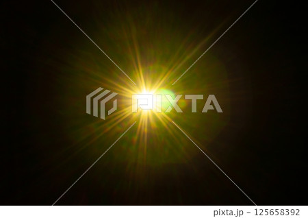 Sun flare on the black background 125658392