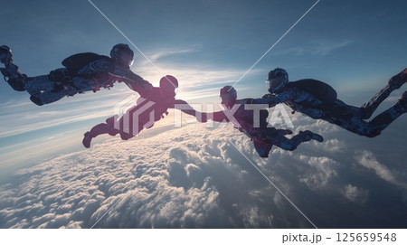 青空に舞うスカイダイビングチーム 125659548