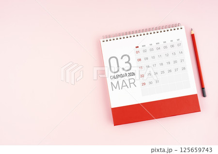 Top view March 2026 desk calendar and pencil, Position with copy space. Top view March 2026 desk calendar and pencil, Position with copy space. 125659743