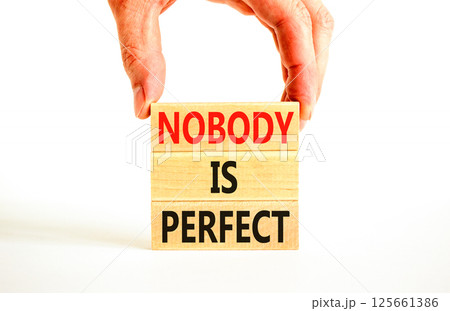 Nobody is perfect symbol. Concept words Nobody is perfect on beautiful wooden block. Beautiful white background. Business motivational lifestyle and nobody is perfect concept. Copy space. Nobody is perfect symbol. Concept words Nobody is perfect on beautiful wooden block. Beautiful white background. Business motivational lifestyle and nobody is perfect concept. Copy space. 125661386