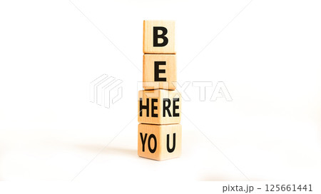 Belonging and belong symbol. Concept words Be here Belong on beautiful wooden block. Beautiful grey table grey background. Business motivational belonging and belong concept. Copy space. 125661441