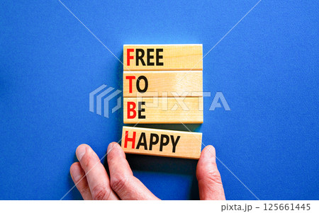 FTBH Free To Be Happy symbol. Concept word FTBH Free To Be Happy on beautiful wooden blocks. Beautiful blue background. Business motivational FTBH Free To Be Happy concept. Copy space. FTBH Free To Be Happy symbol. Concept word FTBH Free To Be Happy on beautiful wooden blocks. Beautiful blue background. Business motivational FTBH Free To Be Happy concept. Copy space. 125661445