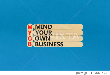 MYOB mind your own business symbol. Concept word MYOB Mind Your Own Business on beautiful wooden sticks. Beautiful blue background. Business MYOB mind your own business concept. Copy space. MYOB mind your own business symbol. Concept word MYOB Mind Your Own Business on beautiful wooden sticks. Beautiful blue background. Business MYOB mind your own business concept. Copy space. 125661479