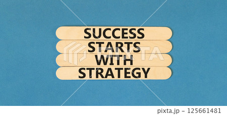 Success starts with strategy symbol. Concept words Success starts with strategy on beautiful wooden sticks. Beautiful blue background. Business and success starts with strategy concept. Copy space. Success starts with strategy symbol. Concept words Success starts with strategy on beautiful wooden sticks. Beautiful blue background. Business and success starts with strategy concept. Copy space. 125661481