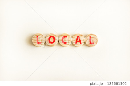 Local symbol. Concept word Local on beautiful wooden circles. Beautiful white table white background. Business lifestyle local concept. Copy space. 125661502